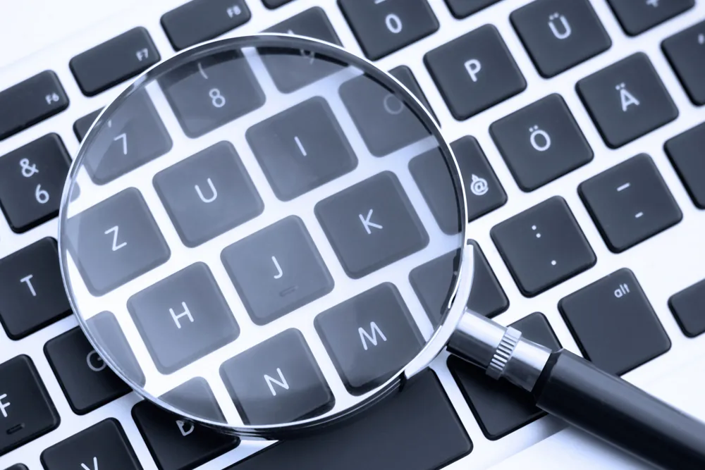 Magnifying glass over keyboard